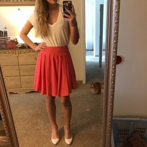 Francesca’s bright pink miniskirt with flare!